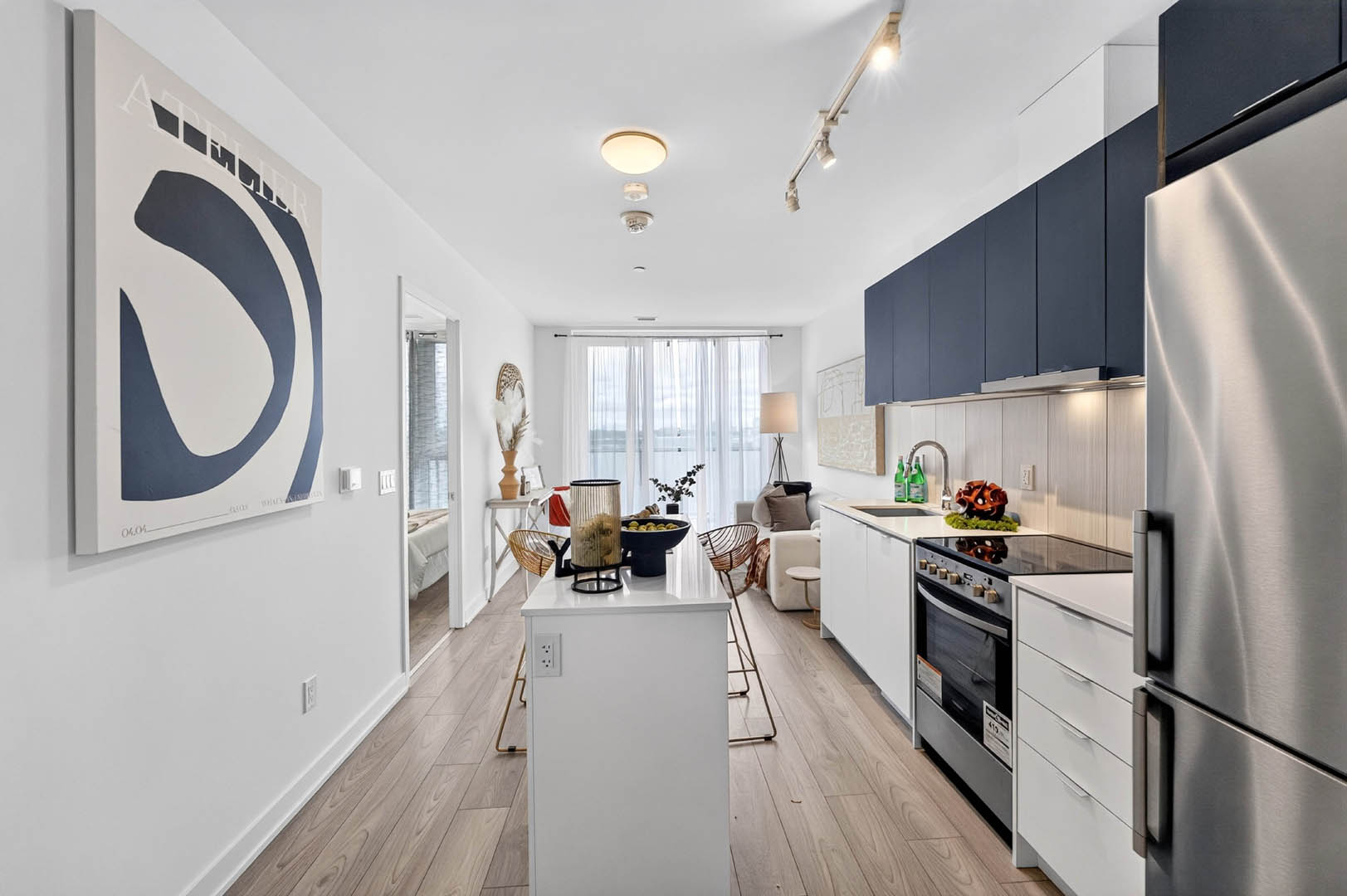 Open-concept living and kitchen at Unit 616